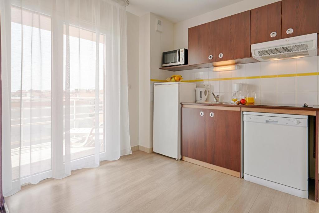 Zenitude Hôtel-résidences Centre Apartahotel 3*